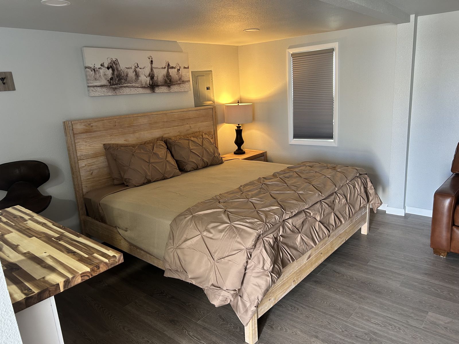 King Suite with sofa, coffee table and kitchenette